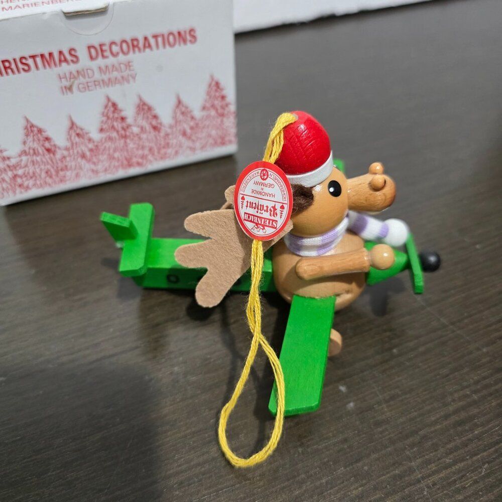 Vtg STEINBACH Christmas Ornament Moose Red Hat in Airplane Hand Germany